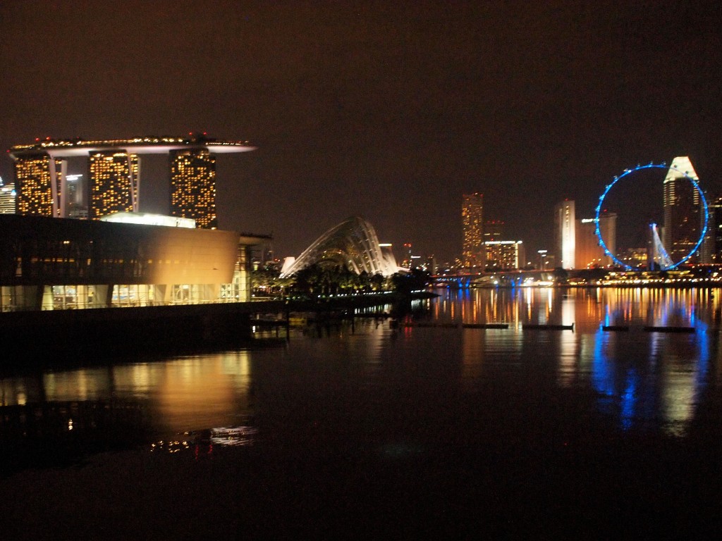 The Marina Bay Sands Casino and the Singapore Flyer as seen from the Marina Barrage. The Singapore Flyer is, at 165 meters, the tallest Ferris Wheel in the world, 30 meters higher than the London Eye and 5 meters taller than the Star of Nanchang. It is built on reclaimed land in Marina Centre. At the top you can see the Indonesian islands of Batam and Bintan and the city of Johor Baru in Malaysia.