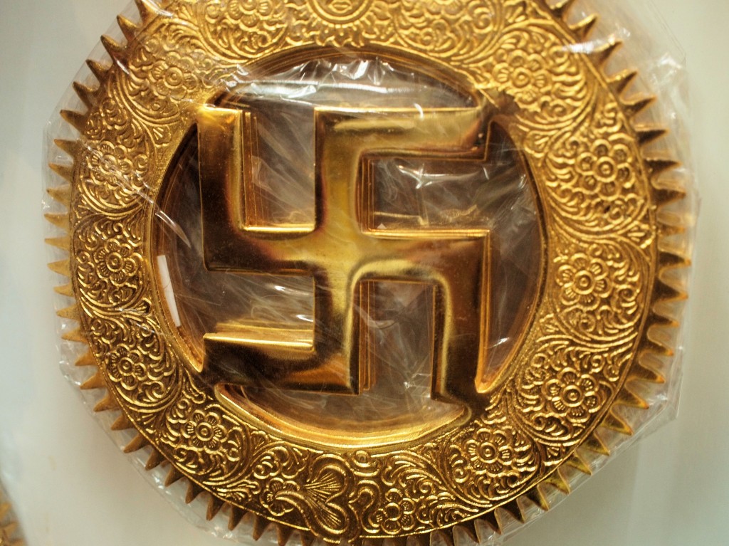The swastika dates back about 10,000 years. Still, it is a bit disconcerting for those of us from the West to see it on a religious artifact because of its 20th century associations.